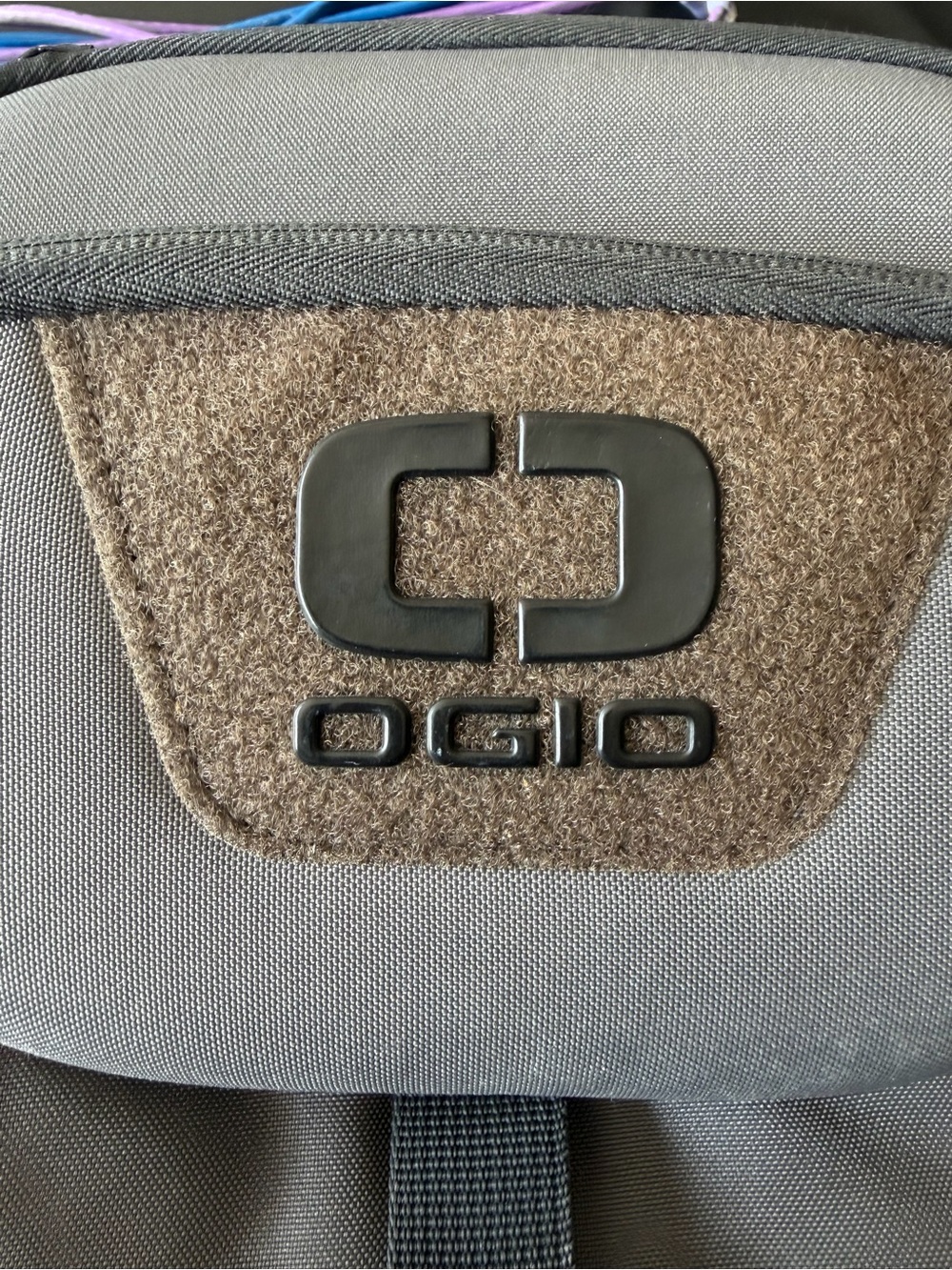 OGIO Gray Backpack with Tan Felt Patch and Black Logo
